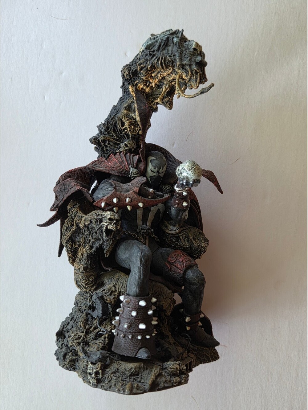 Spawn Collectible Figurine Sitting on Throne Holding Skull